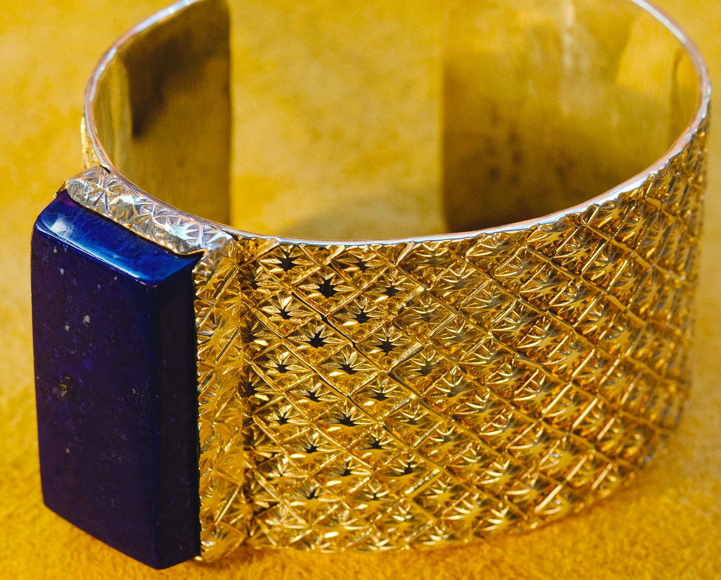 Sam LaFontain, Large Lapis Gem in a Handmade Silver Star Pattern Bracelet