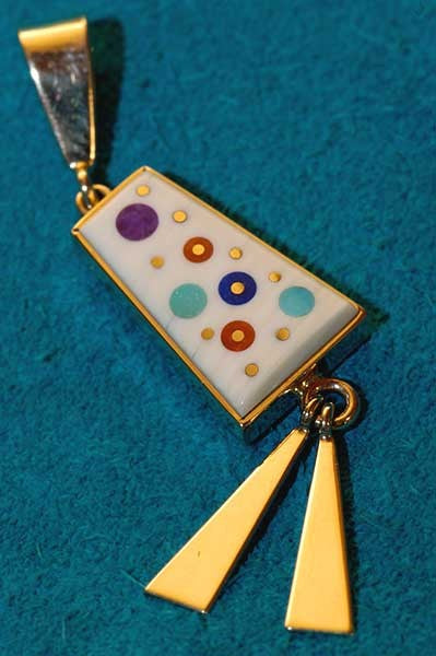 Turquoise gold Pendant jewelry made by Boyd Tsosie