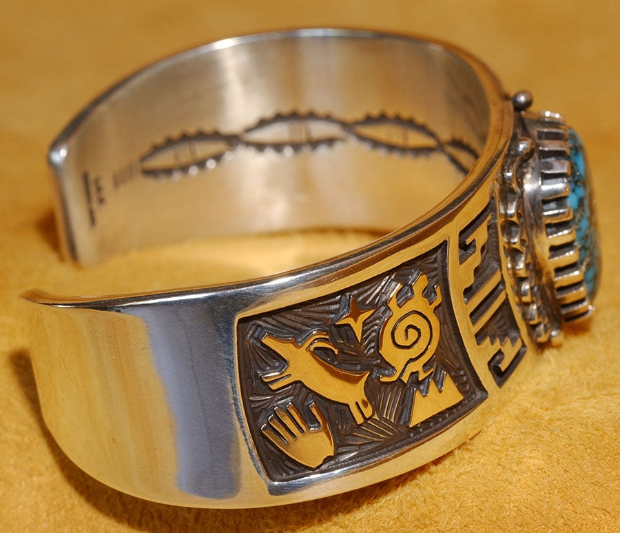 Turquoise, Silver and Gold Bracelet by Arland Ben