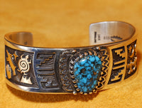 Turquoise, Silver and Gold Bracelet by Arland Ben