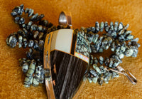Duane Maktima - New Lander Pendant on Yazzie Silver Beads