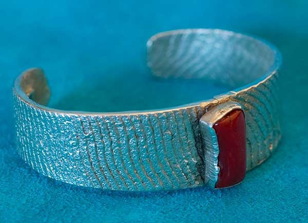 Coral Native American Bracelet by Olin Tsingine